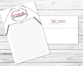 May include: A white lined stationery sheet with a heart-shaped hand design and the text "IT'S ME, HI... I'M THE PROBLEM, IT'S ME". A matching white envelope with a return address label is also included.