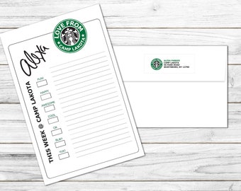 May include: A white sheet of paper with a green and black logo that says "Love from Camp Lakota" and a list of words including "Fund", "Happy", "Awesome", "Cool", "Ok", "Blah", and "Yuki".
