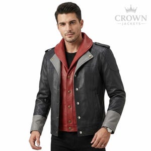 May include: Black leather jacket with a red and gray layered design. The jacket features a button-up front, gray cuffs, and a red collar. The Crown Jackets logo is visible in the upper right corner.