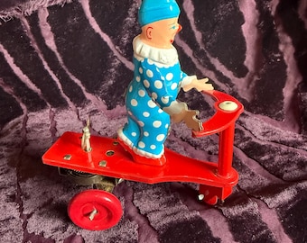 Vintage Roli Zoli Clown Wind-Up Toy on Scooter – 1950s Litho Circus Clown