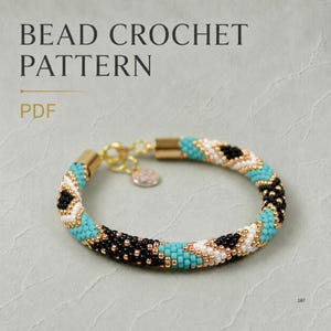 May include: A bead crochet pattern PDF featuring a bracelet made of small turquoise, black, and white beads arranged in a repeating geometric pattern. The bracelet includes gold-toned metal end caps and a small circular charm attached to the clasp.