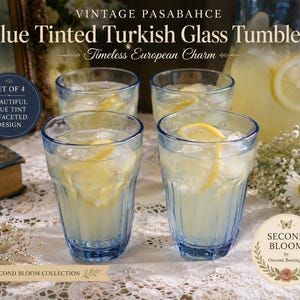 May include: A set of four blue-tinted glass tumblers with a faceted design, each filled with a beverage containing ice and lemon slices. The text on the image reads: VINTAGE PASABAHCE Blue Tinted Turkish Glass Tumblers, Timeless European Charm, SET OF 4.