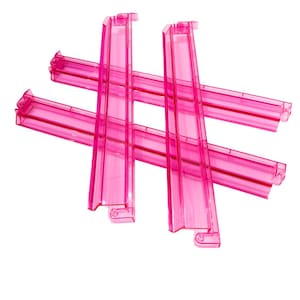 May include: Four translucent pink plastic bag clips arranged in a hashtag shape. The clips are rectangular with a ridged design and a small hook on one end. The background is plain white.