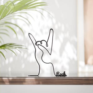 Gepersonaliseerde handfiguur met duivelshoorn - Minimalistische lijntekening