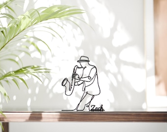 Figura personalizada de saxofonista - Escultura minimalista de líneas