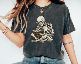 Comfort Colors® Skeleton Reading Book Shirt, Book Lover T-Shirt, Dark Academia Tee, Gothic Halloween Gift, Spooky Reader Gift, Skeleton Tee