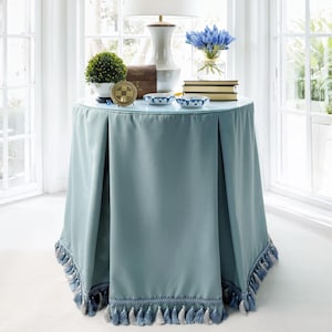 May include: A set of three ceramic mugs with a speckled, matte finish. The mugs are in shades of cream, light gray, and dark gray. Each mug has a simple, minimalist design, perfect for coffee or tea.