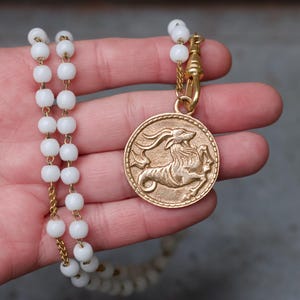 Zodiac Star Sign Capricorn Necklace - Gold Medal Pendant on milk Glass Beads Chain 24 inch long - Vintage Boho Layering Jewellery