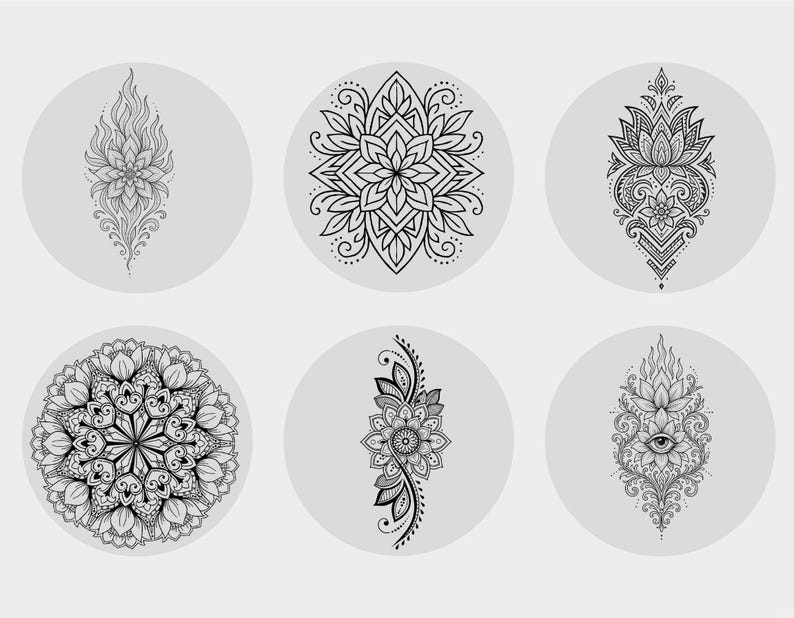 May include: Six black and white mandala designs on grey circular backgrounds. The mandalas feature intricate floral and geometric patterns, including lotus flowers and symmetrical arrangements. The designs are suitable for tattoos or decorative art.