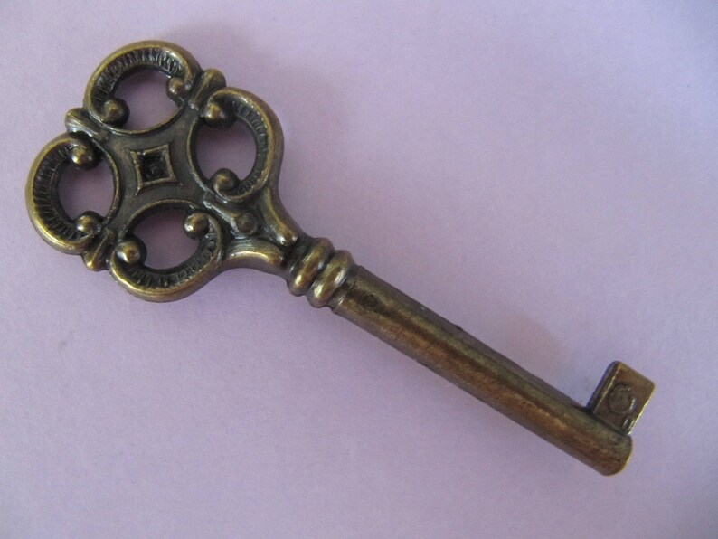ornate bronze square metal key Fancy vintage Skeleton key Santa keys cabinet keys old keys as component for pendants or keychain