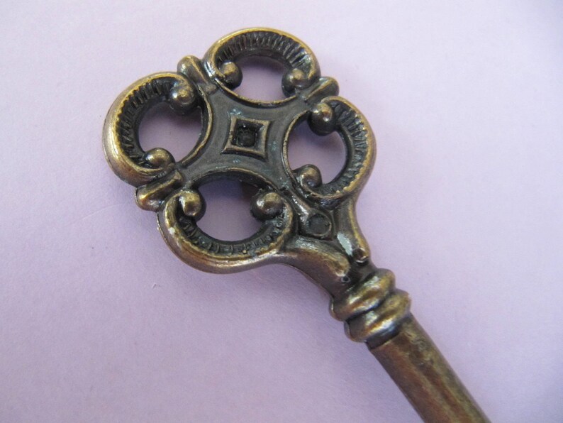 ornate bronze square metal key Fancy vintage Skeleton key Santa keys cabinet keys old keys as component for pendants or keychain
