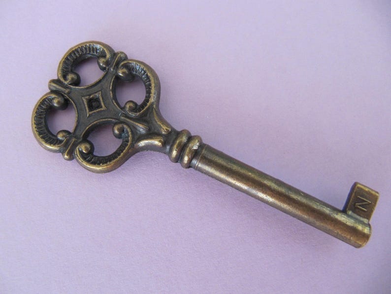 ornate bronze square metal key Fancy vintage Skeleton key Santa keys cabinet keys old keys as component for pendants or keychain