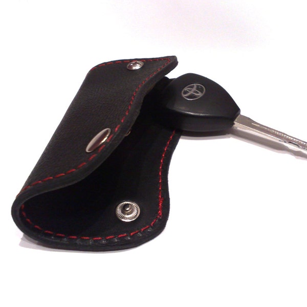 Convenient keychain key holder from genuine leather. Holds regular keys or car key or remote control car, initials
