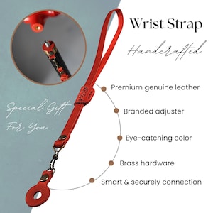 May include: A red leather wrist strap featuring brass hardware, a branded adjuster, and a secure connection point. The text Wrist Strap, Handcrafted, Special Gift For You, Premium genuine leather, Branded adjuster, Eye-catching color, Brass hardware, and Smart & securely connection are visible.