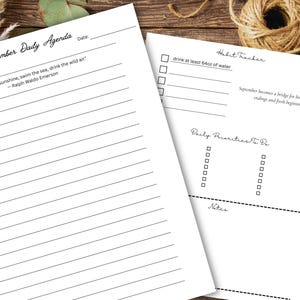 May include: Two white paper sheets featuring black printed text. One sheet is titled September Daily Agenda with hourly lines from 10am to 8pm and a Ralph Waldo Emerson quote. The other sheet includes a Habit Tracker, Daily Priorities To Do list, and Notes.