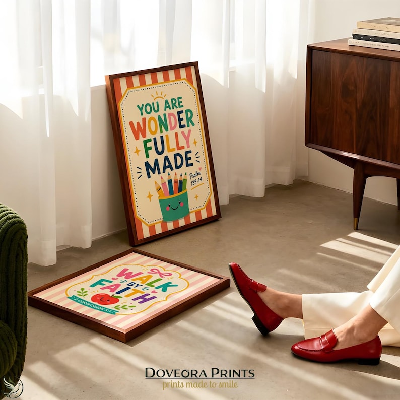 Two framed prints with Bible verses, "You are wonderfully made" and "Walk by faith".