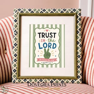 Framed artwork with text "TRUST IN-the LORD He knows the way! PROVERBS 3:5-6".