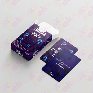 Puede incluir: Una caja y cartas de juego moradas con el texto "SABIAS QUÉ?" y signos de interrogación. La caja y las cartas tienen un diseño en espiral. Las cartas también tienen el texto "¿Qué fruta flota en el agua? → Manzana".