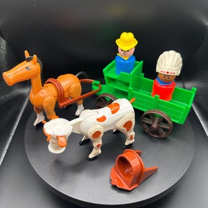 May include: A vintage toy farm set featuring an orange horse pulling a brown cart, a white and orange cow, a green wagon with two figures, and a brown accessory. The figures have yellow hats and blue and red clothing. The set is made of plastic.