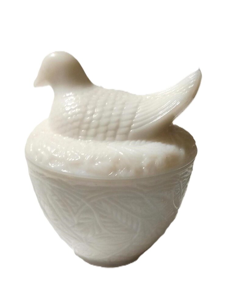 May include: A set of three ceramic mugs with a speckled, matte finish. Each mug features a different color: light blue, cream, and gray. The mugs have a simple, modern design and a comfortable handle.