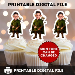 May include: Three cupcakes topped with elf-themed digital file cutouts. The cutouts feature a person with elf ears, a green cloak, and a bow and arrow. The text "PRINTABLE DIGITAL FILE" and "SKIN TONE CAN BE CHANGED" are also visible.