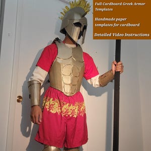 May include: A gold-coloured cardboard Greek armour set including a helmet with a yellow crest, a chest plate with abdominal muscle detailing, and arm guards. The text reads: Full Cardboard Greek Armor Templates, Handmade paper templates for cardboard, Detailed Video Instructions.