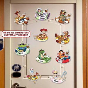 May include: A collection of colorful stickers featuring characters from the Toy Story franchise, each relaxing in a pool float with a drink. The stickers include Woody, Buzz Lightyear, and others. The text "WE DO ALL CHARACTERS CUSTOM ANY REQUEST" is also visible.