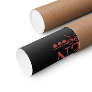 May include: Two rolled posters in brown cardboard tubes. One poster is partially unrolled, revealing a black surface with red text and a crown design. The other tube is closed.