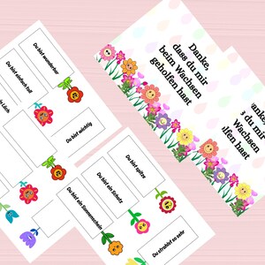 May include: White cards with German text and colorful flower illustrations. The cards feature phrases like "You are wonderful" and "Thank you for helping me grow." The design includes various flowers and a pastel background.