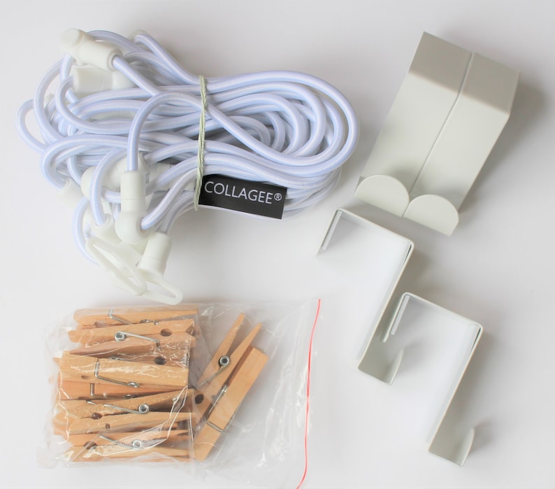 May include: A set of white plastic hooks, a white elastic cord, and a bag of wooden clothespins. The hooks have a label that says "COLLAGEE&reg;".
