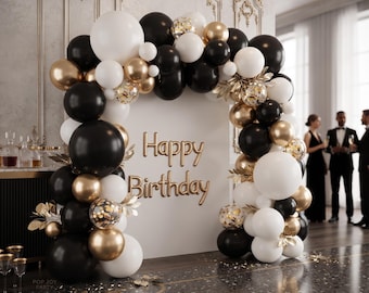 May include: A balloon arch featuring black, white, and metallic gold balloons, including clear balloons filled with gold confetti. A white rectangular backdrop stands in the center with the gold text Happy Birthday attached to the front.