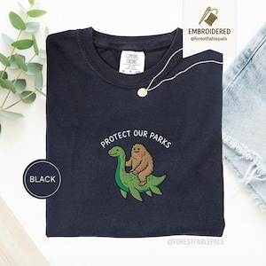 Embroidered Bigfoot Loch Ness Shirt - Protect Our National Parks T-Shirt, Cryptid Tee, Comfort Colors®, Funny Cryptid Gift Black