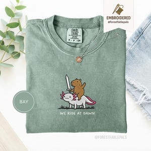 Embroidered Capybara Axolotl Shirt - We Ride at Dawn, Funny Capybara Shirt, Ren Faire Clothing, Cute Animal Gift, Medieval Shirt, CC 1717 Bay