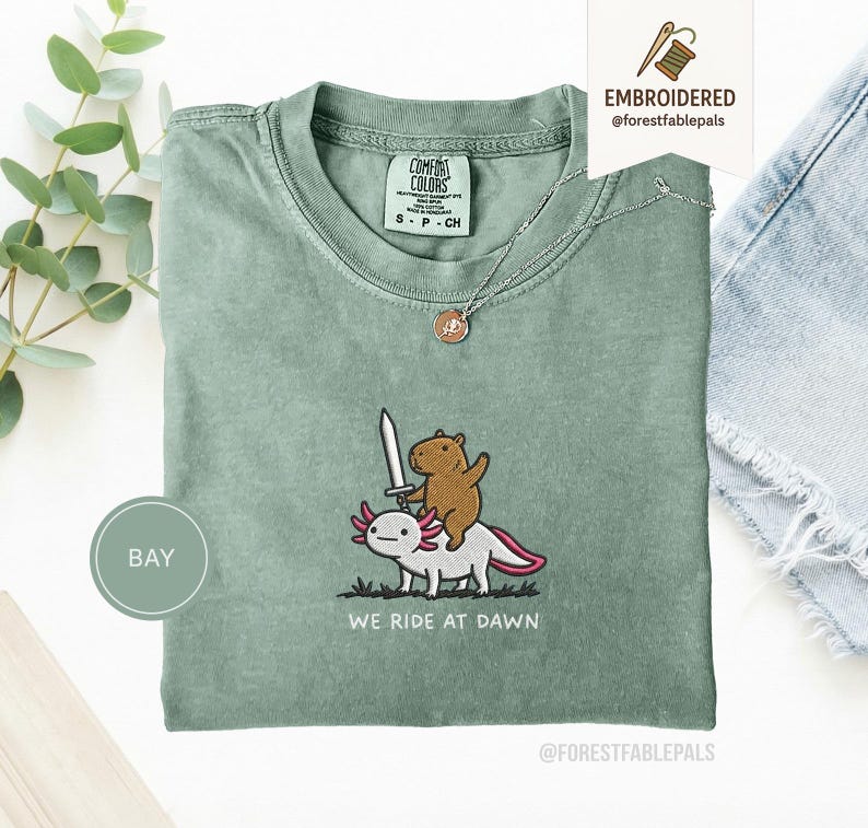 Embroidered Capybara Axolotl Shirt - We Ride at Dawn, Funny Capybara Shirt, Ren Faire Clothing, Cute Animal Gift, Medieval Shirt, CC 1717 Bay