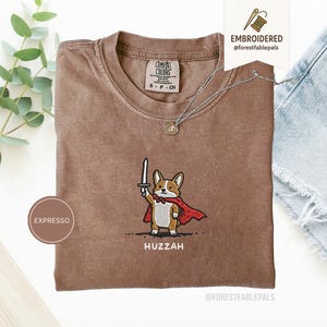 Funny Corgi Sword Shirt, Embroidered Huzzah Corgi Shirt, Medieval Dog Tee, Cute Dog Lover Gift, Renaissance Faire Shirt, Comfort Colors Espresso