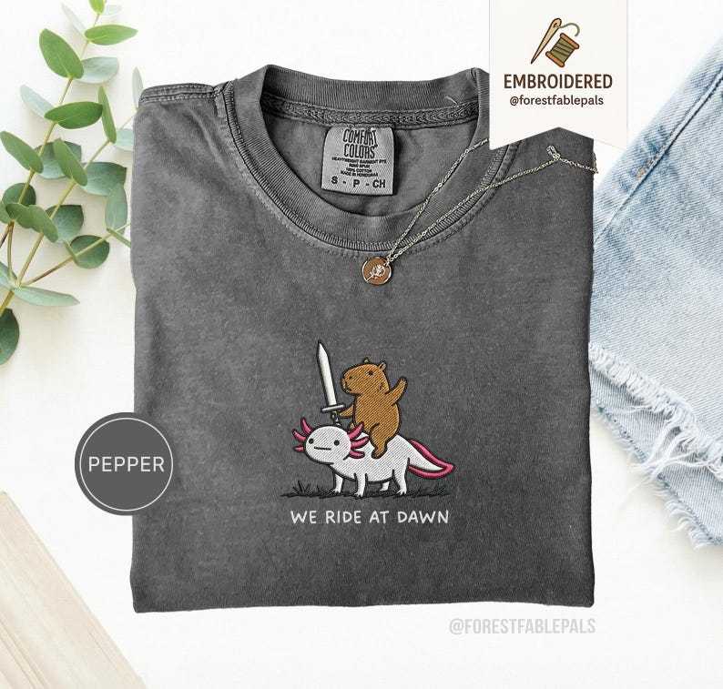 Embroidered Capybara Axolotl Shirt - We Ride at Dawn, Funny Capybara Shirt, Ren Faire Clothing, Cute Animal Gift, Medieval Shirt, CC 1717 Pepper