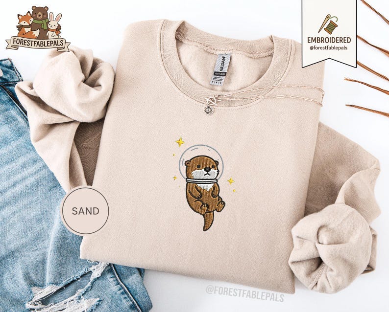 Raum Seeotter Sweatshirt, bestickter Otter Pullover, süßes kosmisches Tier Sweatshirt, Seeotter Liebhaber Geschenk, süßes Tier Sweatshirt Sand