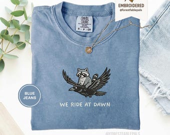 We Ride at Dawn T-Shirt, Funny Raccoon and Crow Raven Tee, Embroidered Comfort Colors 1717, Chaotic Animal Shirt, Whimsical Gamer Gift