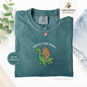 Embroidered Bigfoot Loch Ness Shirt - Protect Our National Parks T-Shirt, Cryptid Tee, Comfort Colors®, Funny Cryptid Gift Blue Spruce