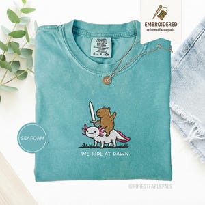 Embroidered Capybara Axolotl Shirt - We Ride at Dawn, Funny Capybara Shirt, Ren Faire Clothing, Cute Animal Gift, Medieval Shirt, CC 1717 Seafoam