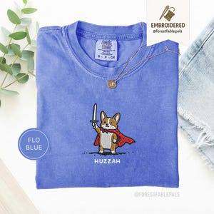 Funny Corgi Sword Shirt, Embroidered Huzzah Corgi Shirt, Medieval Dog Tee, Cute Dog Lover Gift, Renaissance Faire Shirt, Comfort Colors Flo Blue