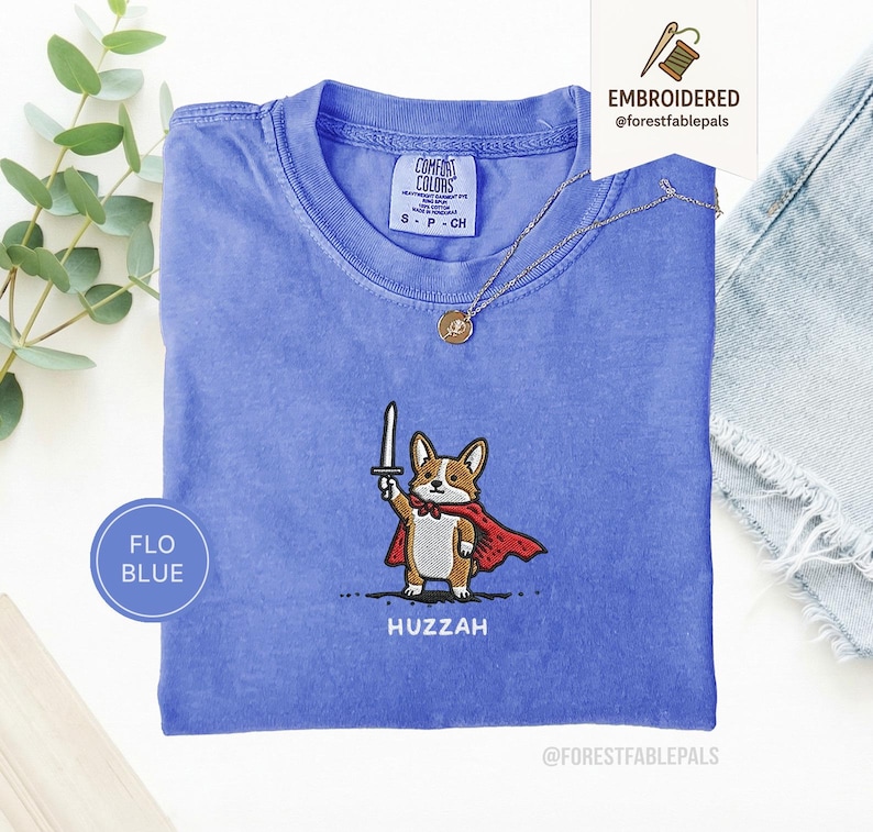 Funny Corgi Sword Shirt, Embroidered Huzzah Corgi Shirt, Medieval Dog Tee, Cute Dog Lover Gift, Renaissance Faire Shirt, Comfort Colors Flo Blue