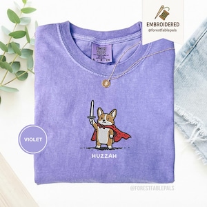 Funny Corgi Sword Shirt, Embroidered Huzzah Corgi Shirt, Medieval Dog Tee, Cute Dog Lover Gift, Renaissance Faire Shirt, Comfort Colors Violet