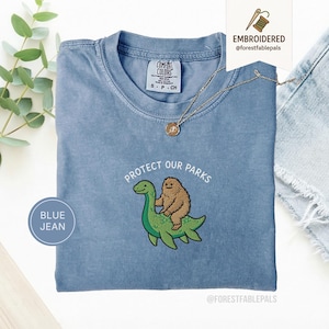 Embroidered Bigfoot Loch Ness Shirt - Protect Our National Parks T-Shirt, Cryptid Tee, Comfort Colors®, Funny Cryptid Gift Blue Jean