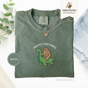 Embroidered Bigfoot Loch Ness Shirt - Protect Our National Parks T-Shirt, Cryptid Tee, Comfort Colors®, Funny Cryptid Gift Moss