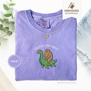 Embroidered Bigfoot Loch Ness Shirt - Protect Our National Parks T-Shirt, Cryptid Tee, Comfort Colors®, Funny Cryptid Gift Violet
