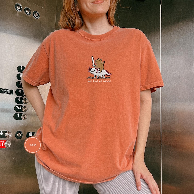 Embroidered Capybara Axolotl Shirt - We Ride at Dawn, Funny Capybara Shirt, Ren Faire Clothing, Cute Animal Gift, Medieval Shirt, CC 1717 Yam