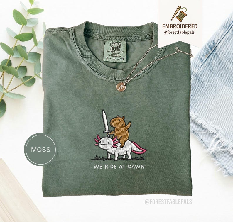 Embroidered Capybara Axolotl Shirt - We Ride at Dawn, Funny Capybara Shirt, Ren Faire Clothing, Cute Animal Gift, Medieval Shirt, CC 1717 Moss