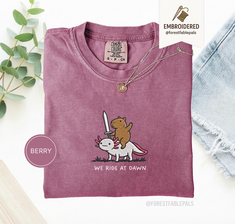 Embroidered Capybara Axolotl Shirt - We Ride at Dawn, Funny Capybara Shirt, Ren Faire Clothing, Cute Animal Gift, Medieval Shirt, CC 1717 Berry