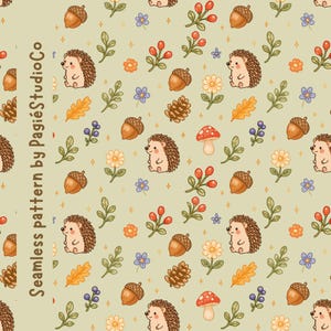 May include: A seamless pattern on a light green background featuring cartoon hedgehogs, brown acorns, pinecones, red mushrooms, orange and blue flowers, and green leaves. The text "Seamless pattern by PagiéStudioCo" is printed vertically.